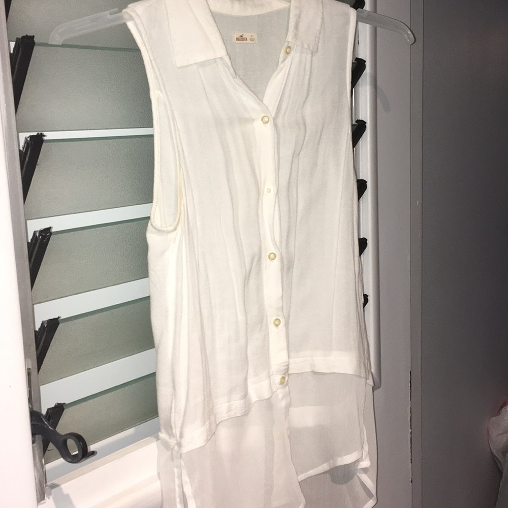 Sleeveless button down shirt with sheer bottom